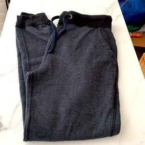 Mens charcoal and black traveler track pants, medium